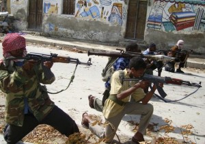 Hardline Somali Islamist militants take position during a stand-off between them and government forces north of Mogadishu