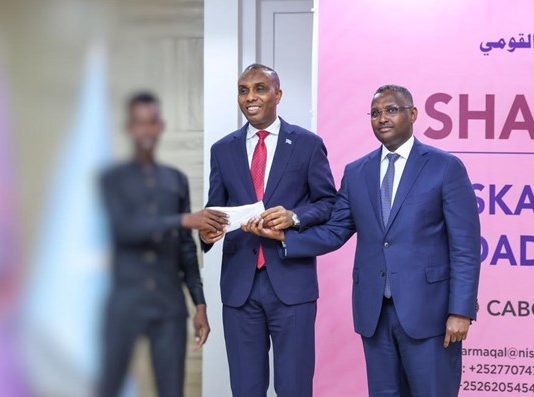 Muwaadin Hay’adaha Amniga La Wadaagey Qarax Mooto Bajaaj Lagu Sidey oo La Gudoonsiiyey Lacag Abaalmarin ah.